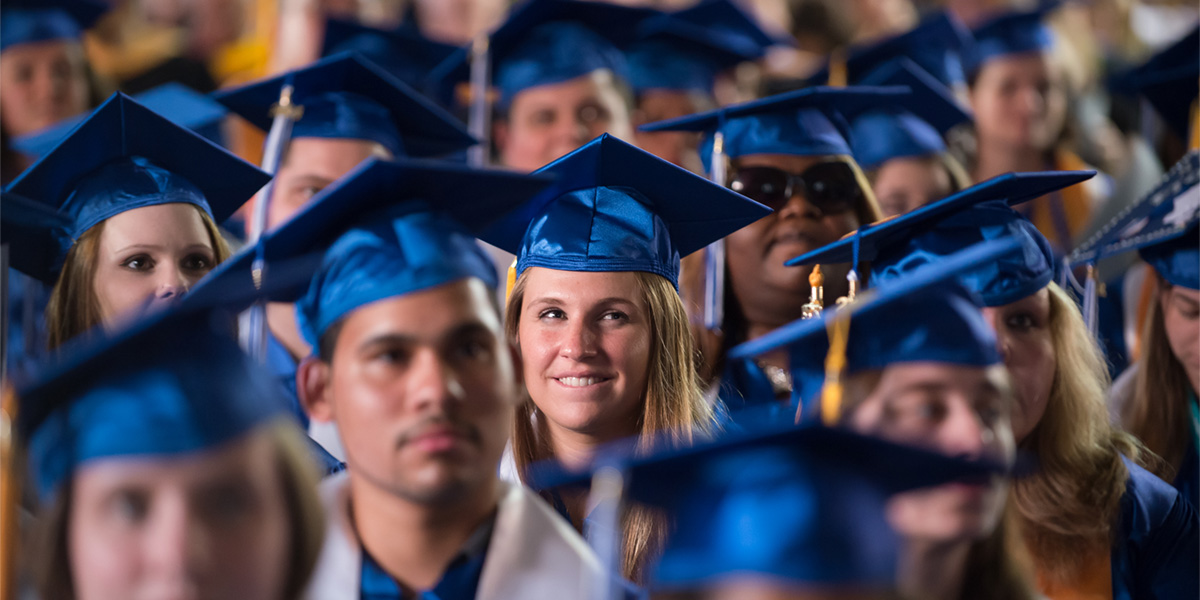 Graduates with cap and gown