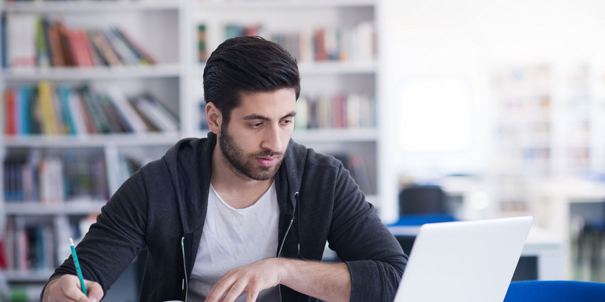 Student studying at computer