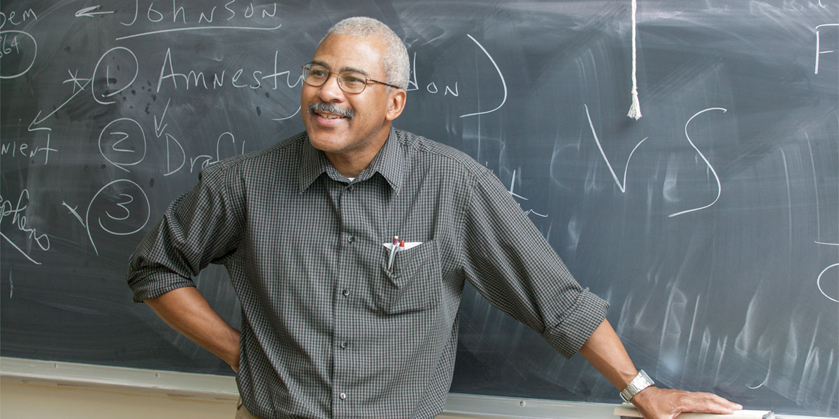 Lester Brooks teaching a history class