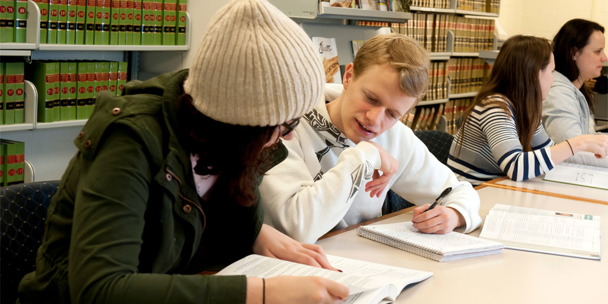 legal studies students in library