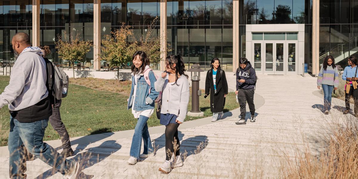 Students walking together outside.