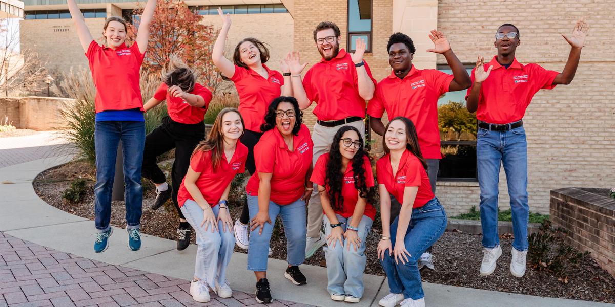 Student Ambassadors posing in a goofy manner.